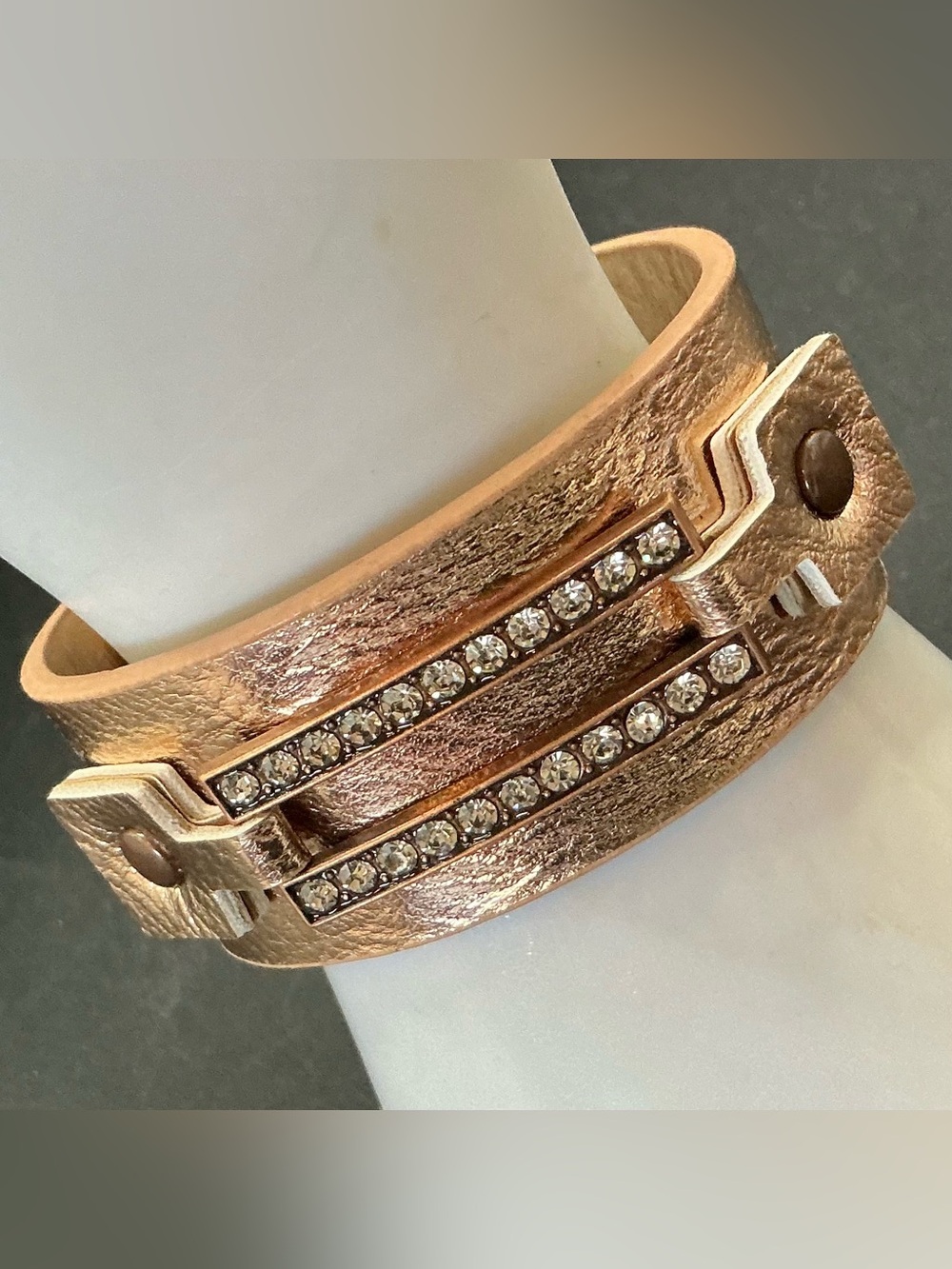 ROSE GOLD TONE RHINESTONE ACCENT FAUX LEATHER SNAP CLOSURE BRACELET